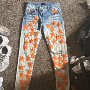 Amiri distressed Orange Star Chemist denim jeans